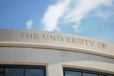 stock-photo-67095855-close-up-of-the-university-of-sign-on-top-of-building