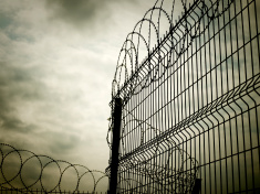 stock-photo-15637116-barbed-wire-fence