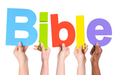 stock-photo-38782648-group-of-multiethnic-hands-holding-bible