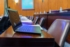 stock-photo-63183555-laptop-at-conference-room